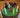 a birthday cake showing horses in a field with candles